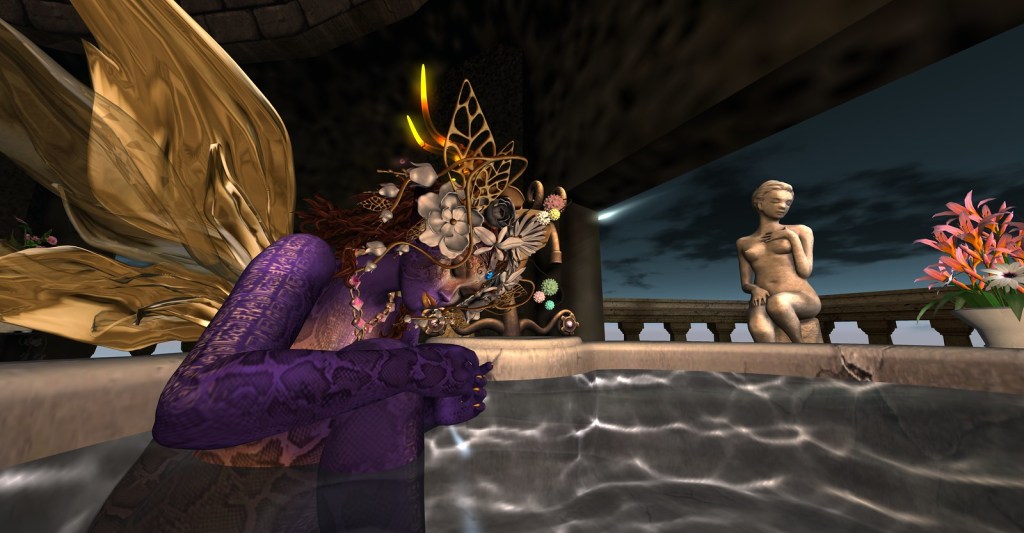 image of a purple moth fairy unwinding in the hot stone pool